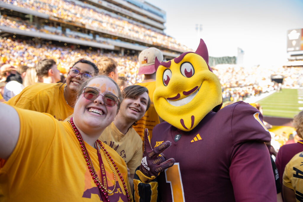 ASU students bring the Sun Devil spirit to Mountain America Stadium, cheering on the team during the ASU vs. BYU Homecoming football game.